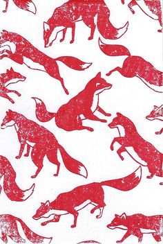 an image of red foxes on white paper