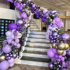 purple and gold balloon garland on stairs