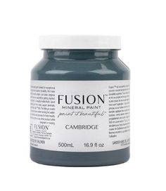 a jar of blue food coloring on a white background with the words, fusion mineral paint