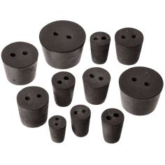 black plastic parts with holes in them on a white background, set of 10 pieces