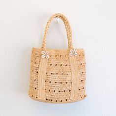 IN STOCK FAST SHIPPING FROM LOS ANGELES Add some coastal charm to your summer look with Elena Handbags Raffia Beach Bag. This shoulder bag is made from natural raffia, complete with a playful shell decoration. Perfect for a day at the beach or a casual outing, it's the must-have accessory for any summer adventure! Natural Soft Raffia Straw Handmade Size: 11"H x 13"W x 6"D Strap drop length: 7" Designer Style ID: 8706 Raffia Beach Bag, Shell Decorations, Coastal Charm, Straw Bags, Raffia Bag, Day At The Beach, Denim Bag, Summer Adventures, Summer Look