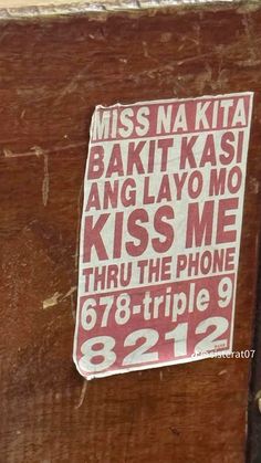 a sticker on the side of a door that says miss na kita baki kas ang layo no kiss me thru the phone