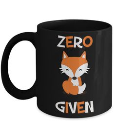 a black coffee mug with an orange fox on it that says, zero given