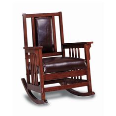 a wooden rocking chair with brown leather upholstered on the seat and backrest