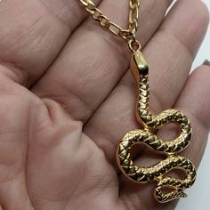 Gold Snake pendant, snake necklace , snake chain necklace, Snake jewelry, Animal necklace, 24k gold filled necklace, bohemian necklace gold Brass 24k plated snake pendant with Figaro stainless steel chain Will ship next working day Silver available here https://www.etsy.com/listing/925133055/snake-ring-silver-ring-statement-ring Metal Snake Chain Necklace Gift, Metal Snake Chain Necklace For Gift, Snake Shape Gold Chain Necklace Gift, Gold Snake Shape Chain Necklace Gift, Gold Snake-shaped Metal Necklace, Gold Plated Snake Chain Necklace Gift, Gold Snake Necklace With Adjustable Chain, Gold Plated Snake Necklace, Spiritual Gold Snake Chain Necklace