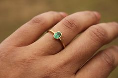 18k Ring With Emerald | Etsy Elegant Green Emerald Ring For Everyday, Minimalist Emerald Ring For Formal Occasions, Everyday Emerald Ring In Yellow Gold, Everyday Minimalist Emerald Ring, Minimalist Green Oval Emerald Ring, Minimalist Oval Green Emerald Ring, Everyday Green Emerald Ring With Bezel Setting, Everyday Green Emerald Ring May Birthstone, Minimalist Green Emerald Wedding Ring