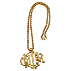 CHRISTIAN DIOR vintage gold tone chain necklace featuring a large C DIOR logo pendant. Secure clasp closure. Embossed CHR. DIOR ©. Indicative measurements : chain length approx. 70.5 cm (27.76 inches) / logo pendant (including bail) approx 6 cm x 5.5 cm (2.36 inches x 2.17 inches). Material : Gold tone metal hardware. NOTES - This is a preloved vintage item, therefore it might have imperfections. - Colors may differ slightly from actual product appearance due to differences in lighting condition Dior Logo, Dior Vintage, Logo Vintage, Metal Hardware, Vintage Logo, Gold Tone Metal, Chain Lengths, Chain Length, Vintage Gold