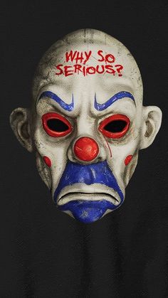 a clown mask with the words why so serious? painted on it