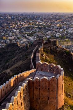 Nahargarh Fort was built in 1734 by the then Maharaja of Jaipur, Sawai Jai Singh II. He constructed the fort as a retreat for the hunting expeditions of the royal family. The fort was initially named Sudarshangarh but was later renamed as Nahargarh. Bali Guide, India Tour, Incredible India, Beautiful Buildings, India Travel, Unesco World Heritage Site, Heritage Site, Beautiful Wallpapers