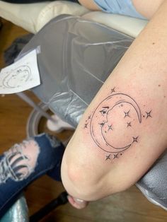 a person with a tattoo on their leg