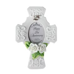 a white cross with flowers on it and the words happy 25th anniversary written in black