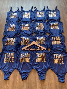 a group of women's swimsuits with team bride written on them