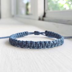 Handwoven W/ Dusty Blue Waxed Polyester Thread In A Macrame Square-Knot Pattern. This Bracelet Is Sturdy & Water-Proof, Perfect For Wearing All Day, Everyday & For Layering With Other Bracelets! Finished W/ A Secure Sliding Knot. : Adjustable Knot! (Fits 5 In. To 8.5 In. Wrist) #: Handmade Bracelet Boho Romantic Goth Fairy Grunge Jewelry Gypsy Stackable Bracelet Dainty Minimalist 90s Y2k 2000s Vintage Retro Jewelry Surfer Beach Coconut Girl Granola Girl Jewelry Bracelet Friendship Gift Cutecore Everyday Bohemian Blue Braided Bracelets, Casual Blue Braided Bracelets, Handmade Blue Waxed Cord Braided Bracelets, Handmade Blue Braided Bracelets With Waxed Cord, Blue Waxed Cord Friendship Bracelets With Sliding Knot, Blue Bohemian Braided Bracelets With Waxed Cord, Casual Blue Bracelets With Waxed Cord, Casual Blue Friendship Bracelet With Adjustable Cord, Blue Braided Bracelet For Beach