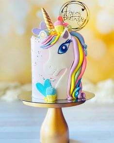 there is a cake that has a unicorn on it