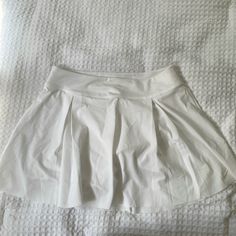 White Nike Tennis Skort. Built In Shorts, Dri-Fit Material. Size Medium, Never Worn. Nike Stretch Short Skort, White Stretch Pleated Shorts, White Pleated Stretch Shorts, Nike Short Tennis Skirt For Summer, Nike Summer Short Tennis Skirt, Nike Summer Tennis Skirt, Nike White Tennis Skirt For Spring, Nike White Fitted Tennis Skirt, Fitted White Nike Tennis Skirt