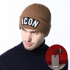 a man wearing a beanie hat with the word icon on it and an image of a lighter