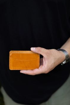 Kelal Card Wallet is designed with simplicity in mind. Its 2-slot construction allows you to carry credit cards, ID and business cards, eliminating unnecessary bulk and clutter. Dimensions: 4.3" L x 2.3" H Features: • Crafted from premium Ethiopian leather. • Please note that since leather is a natural material, each product can have slight color and grain variations. Leather Wallets With Card Slots, Everyday Rectangular Wallets With Id Window, Everyday Rectangular Wallet With Id Window, Everyday Bifold Card Holder With Id Window, Rfid Blocking Bifold Card Holder, Minimalist Rectangular Card Holder, Bifold Card Holder With Card Slots For Personal Use, Leather Card Holder With Slots, Leather Card Holder With Card Slots