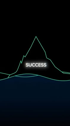 a neon sign that reads success in front of a mountain