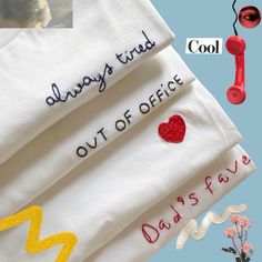 three towels with embroidered words on them, one has a red heart and the other says always find out of office