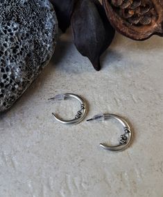 "Silver small moon face hoop earrings, dainty half moon stud earrings, womens everyday stud earrings, celestial jewelry, christmas gift idea Welcome to my shop! ✈️ DHL EXPRESS SHIPPING AVAILABLE, 1-3 BUSINESS DAYS DELIVERY! ✔️ PLEASE MAKE SURE TO SELECT IT, RIGHT BEFORE YOUR PURCHASE! ❗️ ❗️ DON'T FORGET TO ADD YOUR CELL # AT THE \"NOTE TO SELLER\" SECTION IF YOU CHOOSE DHL! BY FILLING YOUR CELL NUMBER YOU EARN THE BENEFIT TO CHOOSE BETWEEN 6 DIFFERENT DELIVERY OPTIONS! INSTRUCTIONS WILL BE SENT Silver Celestial Earrings, Moon Priestess, Silver Moon Earrings, Everyday Stud Earrings, Boy Genius, Moon Stud Earrings, Everyday Earrings Studs, Noah Kahan, Moon Face