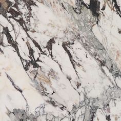 an abstract marble pattern with brown and white colors