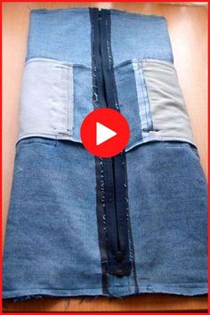 a piece of denim with zippers is shown on the floor, and there is a video about how to sew