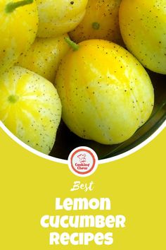 a bowl filled with lemons sitting on top of a green tablecloth next to a yellow background