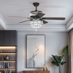 a living room with a ceiling fan and a painting on the wall next to it