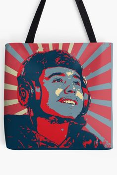 a red and blue tote bag with an image of a man wearing headphones