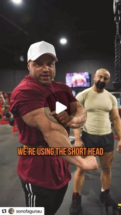 two men in a gym with the words we're using the short head