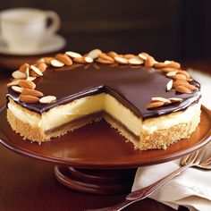 a chocolate and almond cheesecake on a plate