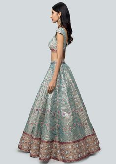 Turkish blue embellished heavy kali plastic mirror work tissue lehenga with broad border lehenga, sleeveless blouse and cutwork border dupatta. Blue Embellished Lehenga For Diwali, Blue Semi-stitched Embellished Lehenga, Semi-stitched Embellished Blue Lehenga, Embellished Blue Lehenga With Traditional Drape, Traditional Blue Embellished Lehenga, Blue Bollywood Embellished Lehenga, Blue Embellished Bollywood Lehenga, Floor-length Embellished Blue Choli, Blue Embellished Anarkali Lehenga