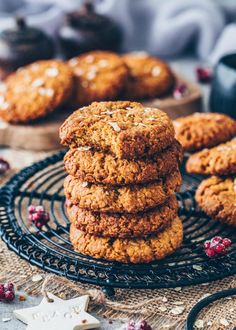 a stack of cookies sitting on top of a metal rack