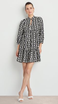 A boho classic, this printed A-Line dress is updated with a modern geo print. Neck Tie Elastic Cuffs A-Line Cut A Line Cut, Ellen Tracy, Geo Print, Tiered Dress, Fabric Care, Neck Tie, A Line Dress, Neck Dress, A Line