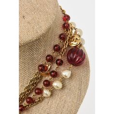 This fabulous long vintage Chanel sautoir necklace has red gripoix glass beads, faux pearls interspersed along the gold metal link chain. The red glass beads are 2 different sizes. It can wrap 2 or 3 times over on your neck or you can stagger it. It is marked Made in France Chanel 1984. it comes in a Chanel box and belonged to a big Chanel collector who may have worn this necklace once. It is 35" long or high when closed and opened up 68" L. The size of the big red glass fluted bead balls are 1/ Vintage Red Chain Necklace, Red Pearl Chain Necklace For Party, Necklace Chanel, Chanel Box, Flute Glass, Accessories Jewelry Necklace, Fabulous Jewelry, Modern Branding, Vintage Chanel