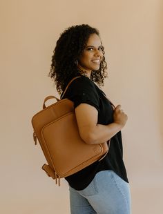 The Olivia Backpack is the most sleek and stylish backpack we've made! Conveniently made to store all the necessary things, including any 13" laptop.  Plenty of pockets to hold and store all the essentials (phone, Chapstick, wallet, hand sanitizer, etc.). Use it for work, school, travel, and everything else in-between. Backpack With Luggage Sleeve For On-the-go, Versatile Laptop Backpack With Sleeve, Versatile Laptop Bag With Sleeve Backpack, Versatile Laptop Bag With Sleeve In Standard Backpack Style, Versatile Backpack With Laptop Sleeve For On-the-go, Commuting Laptop Bag With Sleeve, Travel Laptop Bag With Sleeve In Standard Backpack Shape, Travel Laptop Bag With Sleeve, Everyday Rectangular Backpack With Luggage Sleeve