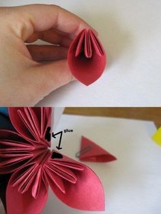 someone is making something out of paper and then folding it in half to make an origami flower