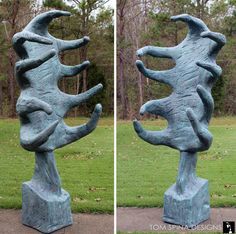 two pictures of a blue sculpture in front of a grassy area with trees and grass