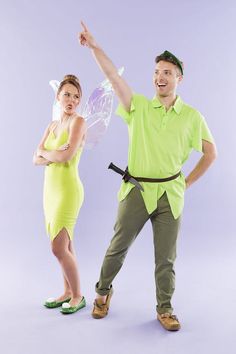 a man and woman dressed as tinkerbell and peter pan