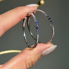 14KT white gold multi-tonal blue sapphires + diamond prong-set diamond hoop earrings. Matching bracelet also available. Lovely, ombre blue sapphires!! Lively diamonds and sapphires! Pictures do not do these earrings justice! Length: 34mm Thickness: 1mm~ 2.5mm tapers by size of stone Weight: 5.6 Grams Stamped 14K 1 3/4 Multi Sapphires Carat total weight 1/3 CT natural, round diamonds White Gold Sapphire Jewelry With Sparkling Stones, Formal Blue Hoop Earrings With Prong Setting, Luxury Blue Hoop Jewelry, Fine Jewelry Sapphire With Sparkling Stones, Sapphire Jewelry With Vvs Clarity In Round Shape, Sapphire Round Hoop Earrings Fine Jewelry, Round Sapphire Jewelry With Vvs Clarity, Sapphire Hoop Earrings Fine Jewelry, Blue Round Hoop Earrings For Formal Occasions