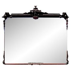 an ornate mirror is shown against a white background