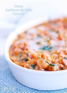 a close up of a bowl of food on a table