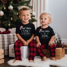 Get into the festive spirit with these adorable matching Christmas shirts for the whole family! Made with 100% Airlume combed and ring-spun cotton, these lightweight shirts are perfect for all your holiday activities. Whether you're dashing through the snow or cozying up by the fireplace, these shirts are sure to spread some seasonal cheer.  - Made with 100% Airlume combed and ring-spun cotton - Lightweight fabric perfect for layering - Retail fit for casual and semi-formal settings - Classic crew neckline for easy accessorizing - Manufactured in humane, sustainable way by Bella+Canvas Don't miss out on the chance to create lasting memories with your loved ones this Christmas season. Order your matching family Christmas shirts today! Matching Christmas Cotton Tops, Matching Cotton Christmas Tops, Matching Cotton Tops For Christmas, Festive Family Matching T-shirt For Holidays, Winter Festive Family Matching T-shirts, Family Matching Festive Crew Neck T-shirt, Casual Family Christmas T-shirt, Casual Christmas T-shirt For Family, Family Matching Festive Short Sleeve Tops