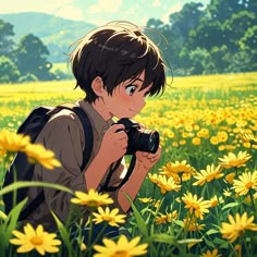 a boy in a field with yellow flowers holding a camera and looking into the distance