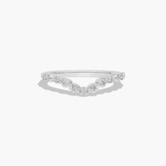 a white gold ring with diamonds on it