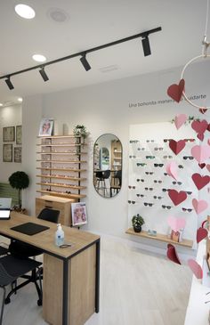 the interior of an office decorated with hearts