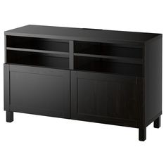 a black entertainment center with two doors and shelves on one side, an open shelf to the other