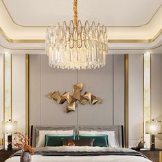 a large bed sitting under a chandelier in a bedroom