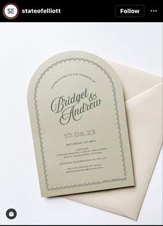 a wedding card with the words, bridge and andrew on it next to an envelope