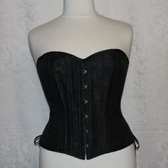 Black Overbust Corset, Heavy Duty Steel Bonded, Thick Good Quality Material, Robust Front Closure (Hook And Eye) On The Front And Lacing On The Back. #0754 All Measurements Are Taken With The Garment Laying Flat. Please Allow 1/2 Inch Either Way Due To The Condition Of The Item. Elegant Black Corset With Boned Bodice, Classic Fitted Corset For Party, Elegant Black Boned Bodice Corset, Elegant Black Corset For Wedding, Elegant Black Wedding Corset, Elegant Black Fitted Corset, Elegant Fitted Black Corset, Elegant Black Overbust Corset, Classic Black Fitted Corset